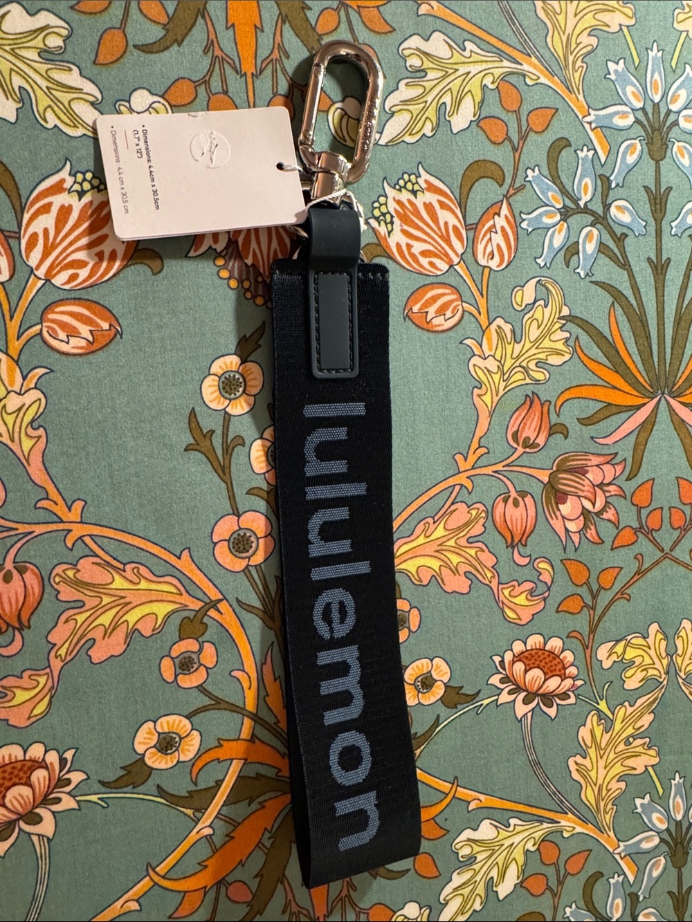 Lululemon never lost blue key chain. NWT